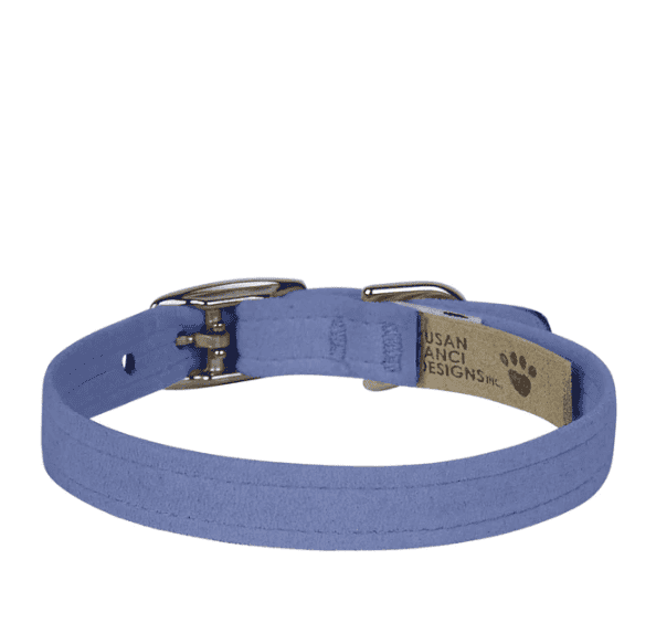 A dog collar in light blue color with metal buckle and paw print tag, designed for pet comfort and style. Perfect for small to medium-sized dogs, featuring durable materials and adjustable fit.
